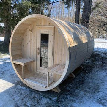 ct serenity barrel finnish sauna in snow front view