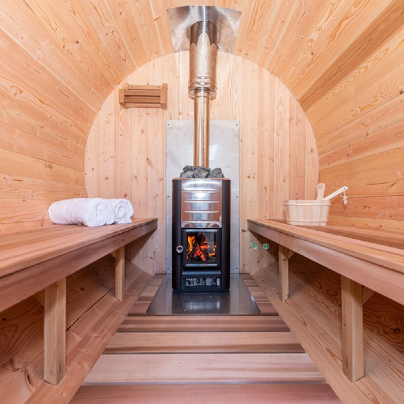 ct serenity barrel finnish sauna indoor view with wood burning heater